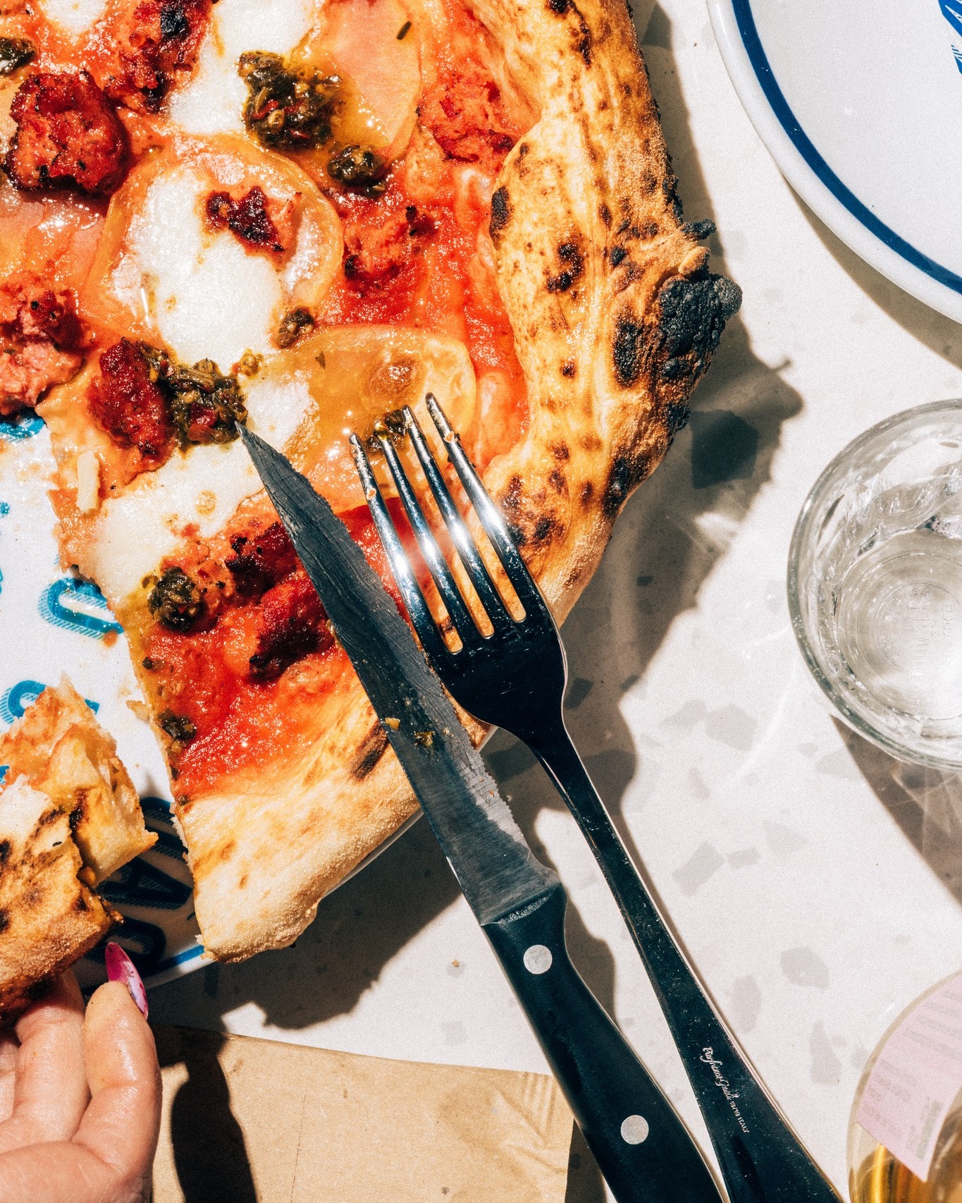Pizza, vini naturali e musica da UÀO
